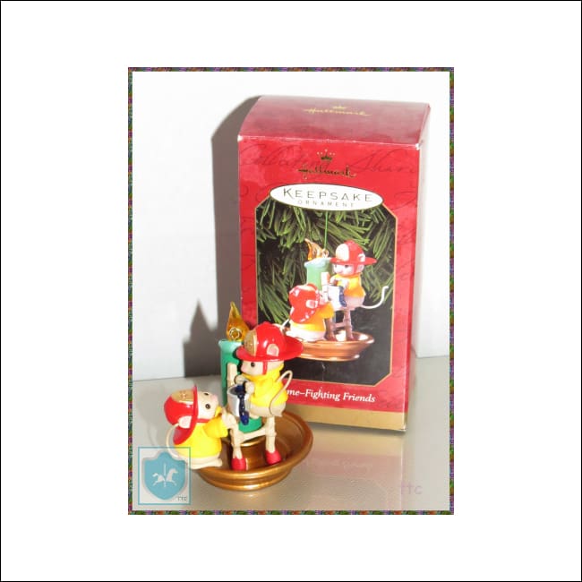 1999 Hallmark - Keepsake - FIREFIGHTER - Christmas ornament - figurine w box - 2.50''tall - Toffey's Treasure Chest